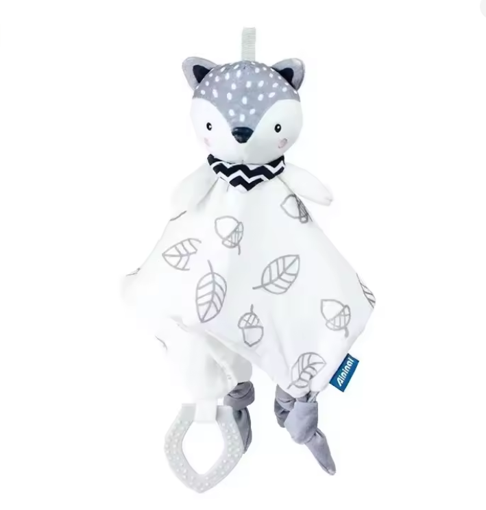 Doudou peluche renard blanc bébé avec hochet et couverture feuilles

