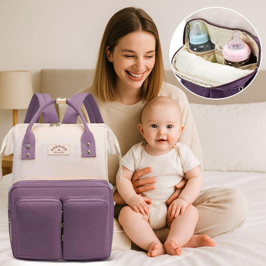 Sac a langer violet porte par une maman avec son bebe - compartiment bouteille visible